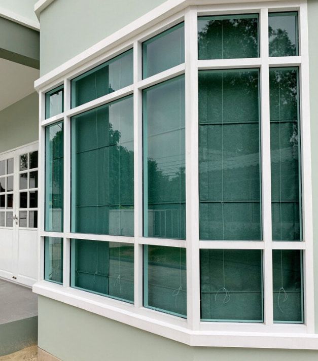 A Large Window on the Side of a House — TSR Tinting & Frosting in Maroochydore, QLD