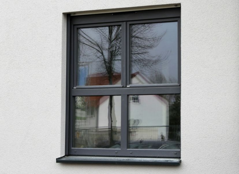 A Building With a Blue Sky Reflected in the Windows — TSR Tinting & Frosting in Maroochydore, QLD