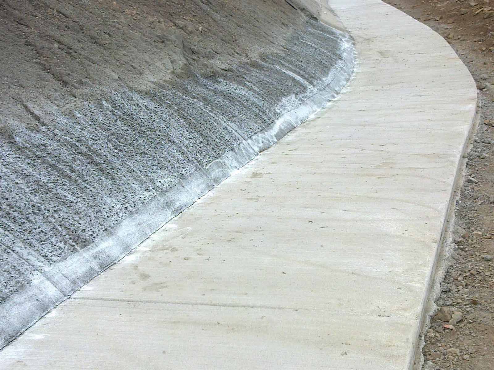 A Close Up Of A Concrete Wall With A White Border — TP Concreting In Warilla, NSW