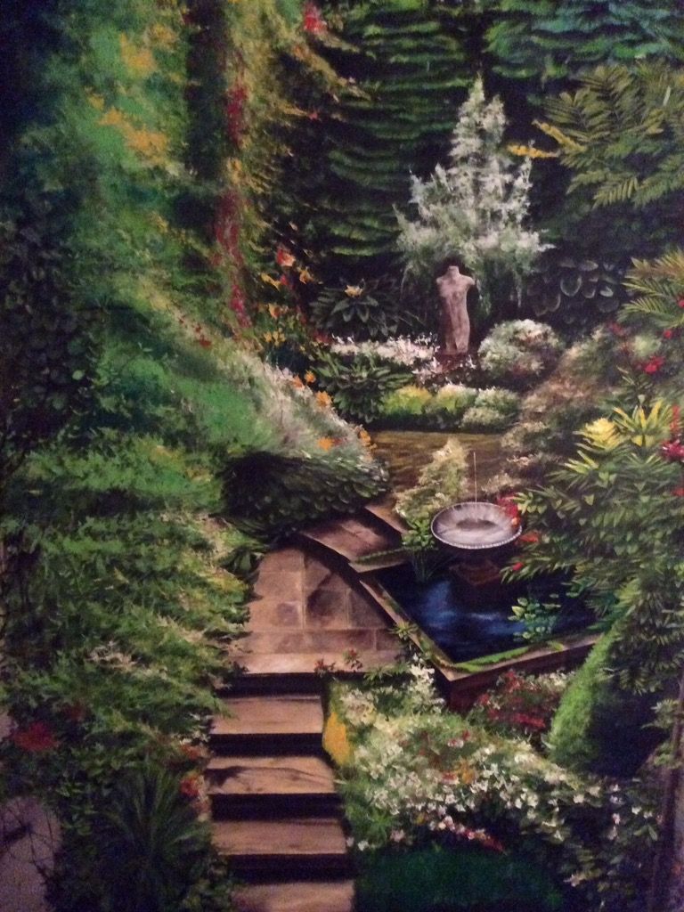 A painting of a garden with stairs leading up to it