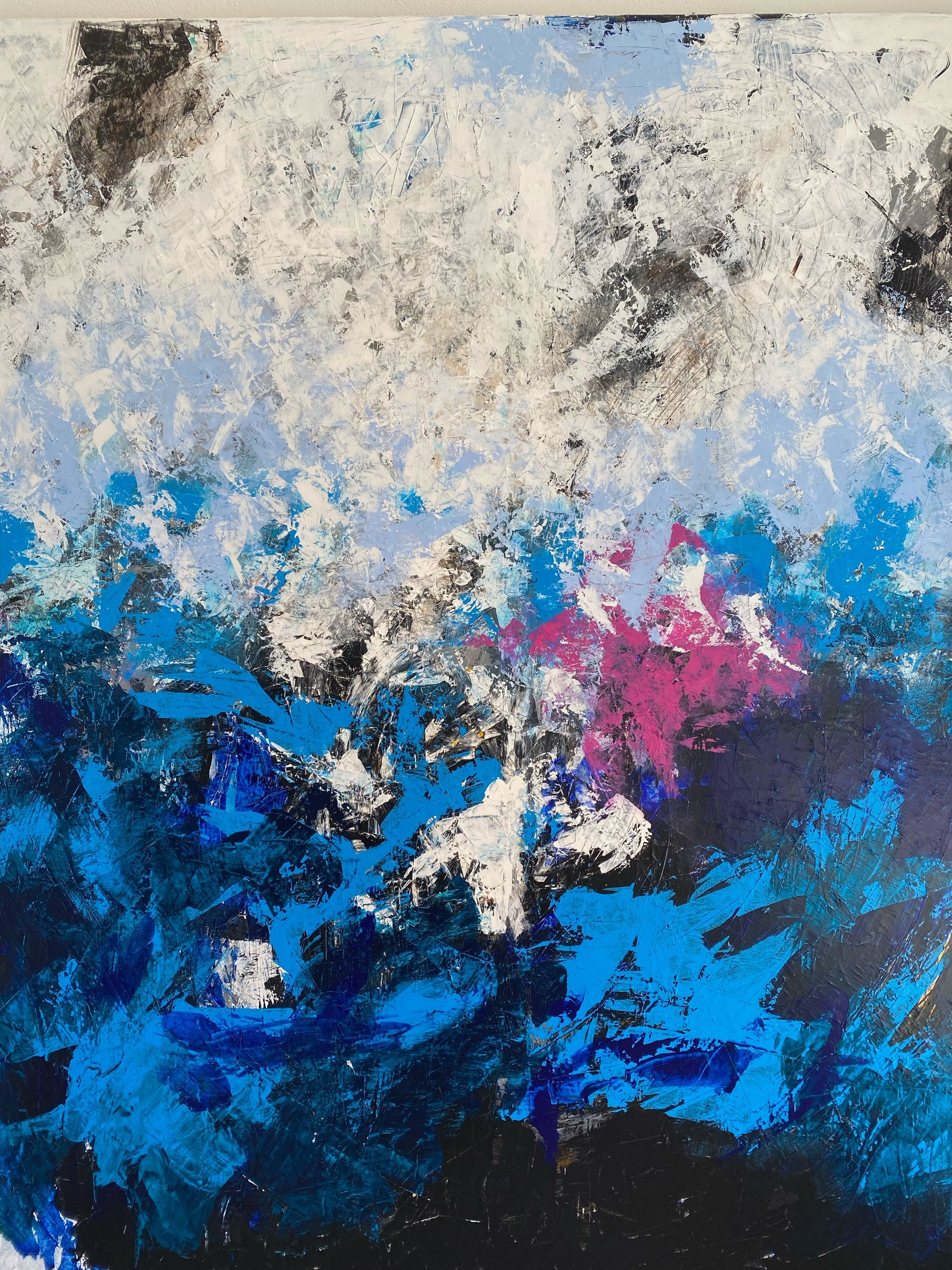 A close up of a blue and white painting