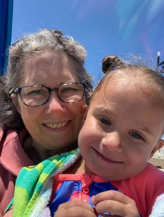 A close up of a woman 's face with a white background