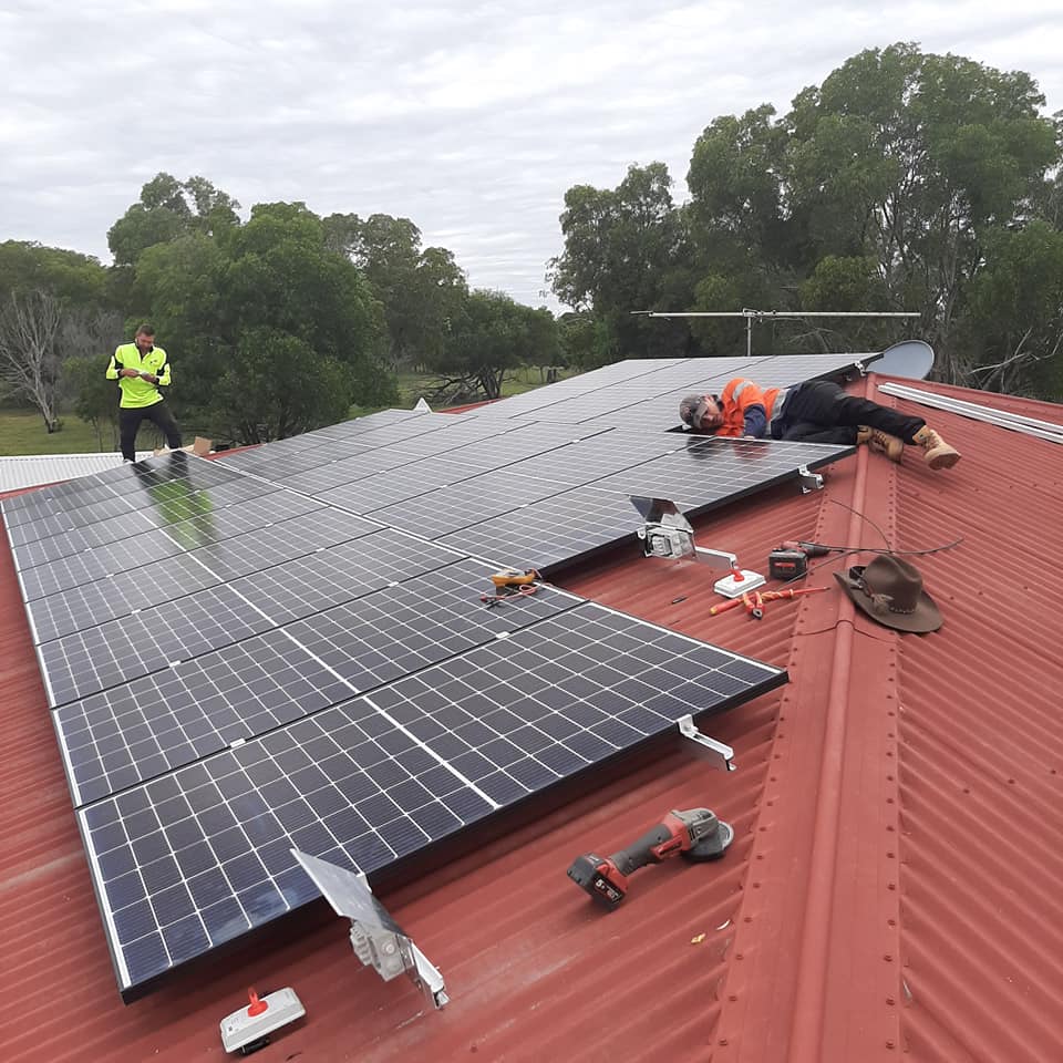 Solar Panel Pattern on Red Roof - Electricians in Nanango, QLD