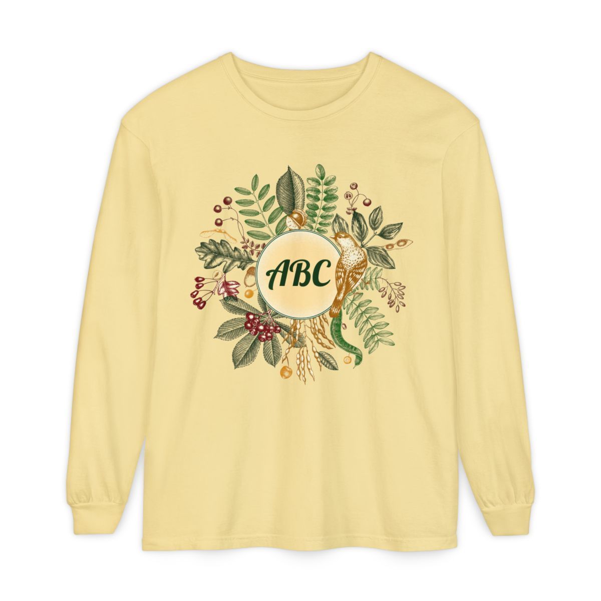 Light yellow long-sleeved shirt with a floral wreath design and personalization letters inside a circle.