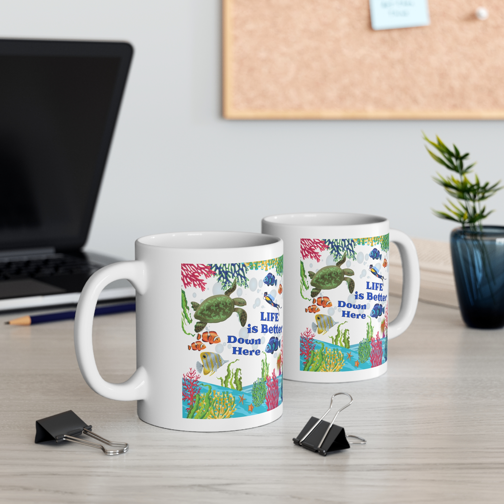 White mug with underwater scene: sea turtle, fish, diver, coral, and the text