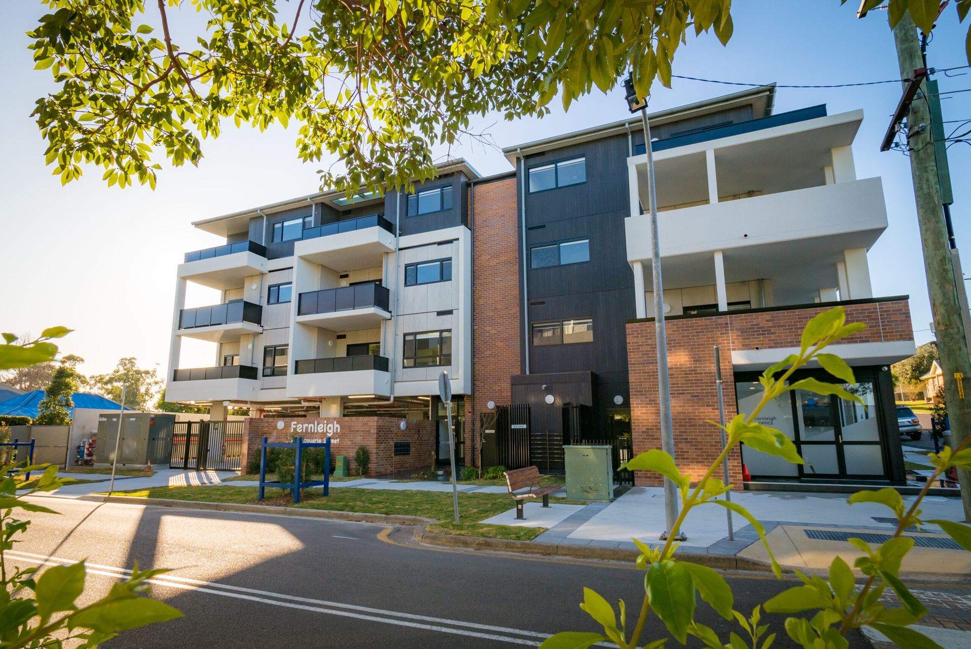 A large apartment building with a lot of windows and balconies