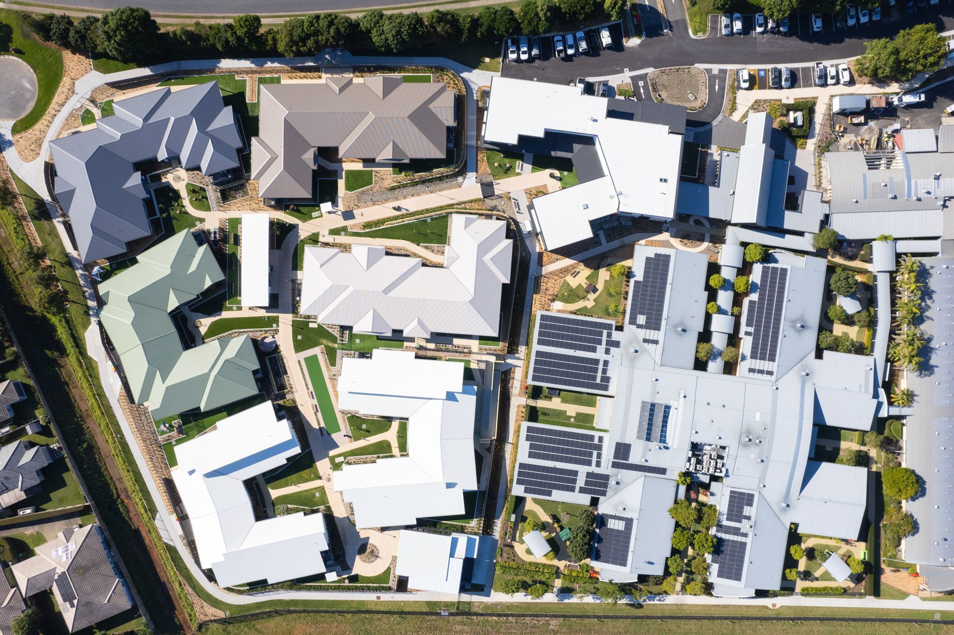 An aerial view of a residential area with lots of buildings