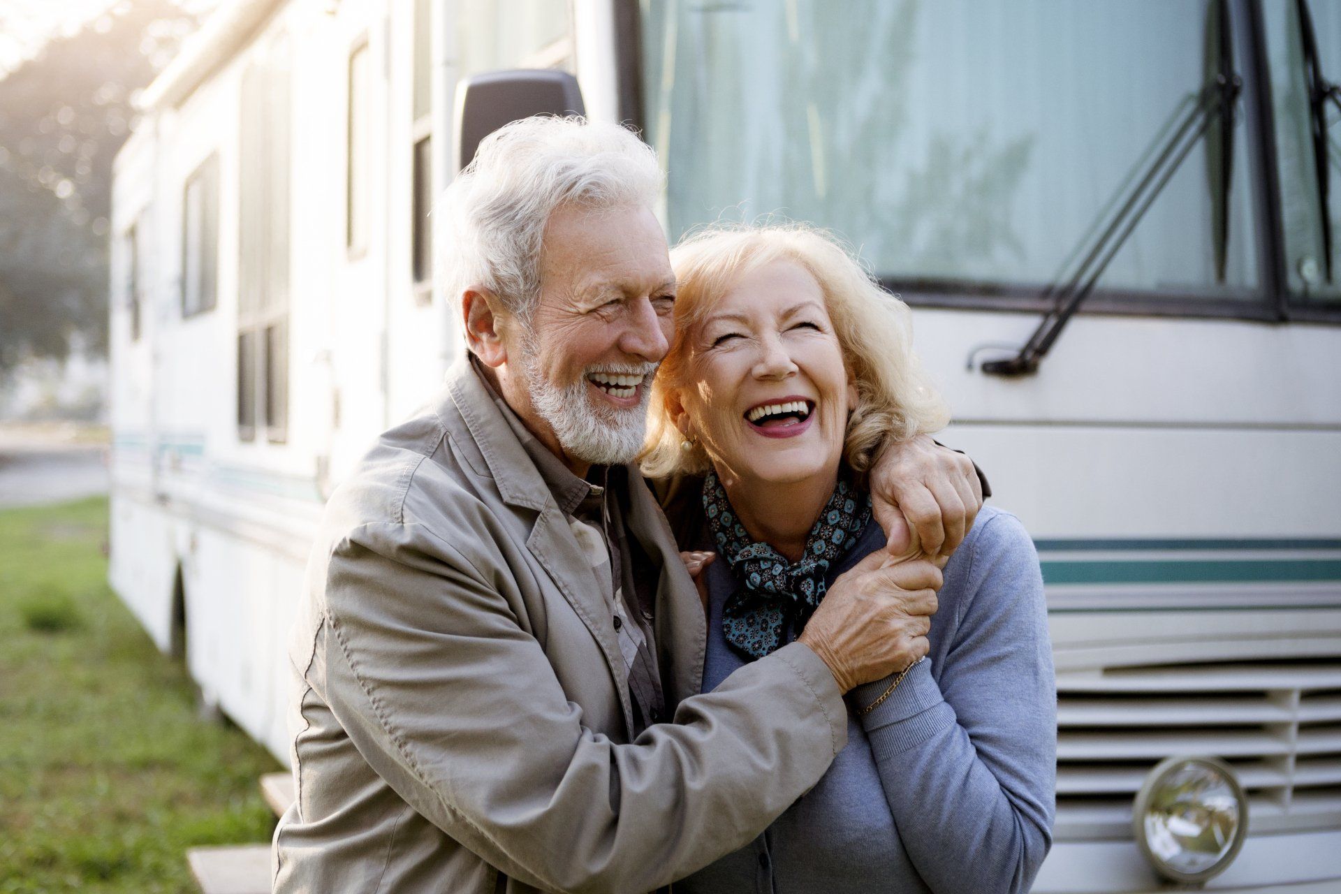 Mature couple together near an RV