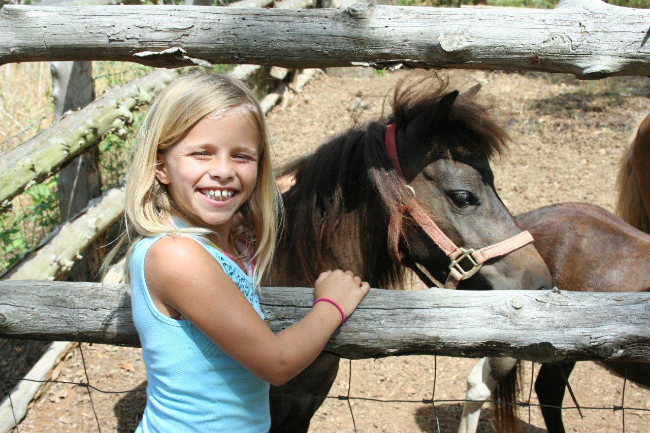 Young girl with horse