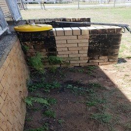 Weeded wall before — Gallery in Mackay, QLD