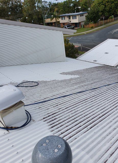 Painted white roof — Commercial Pressure Cleans in Mackay, QLD