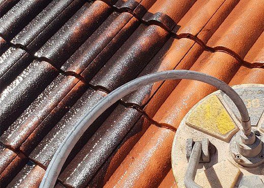 Newly painted clay roof — Contact Us in Mackay, QLD