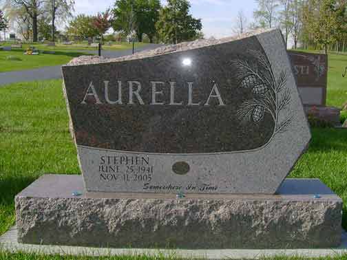 Headstone in a cemetery, engraved with the name 