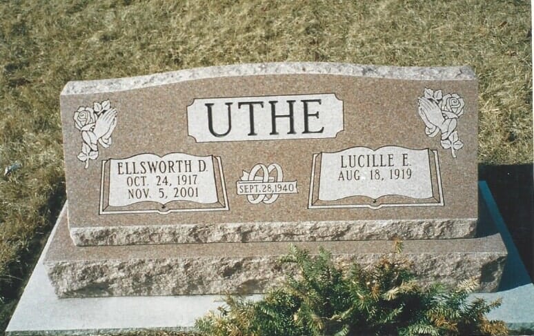 Headstone for the Uthe family; Ellsworth D. (1917-2001) and Lucille F. (1919). Light brown granite with engraved details.