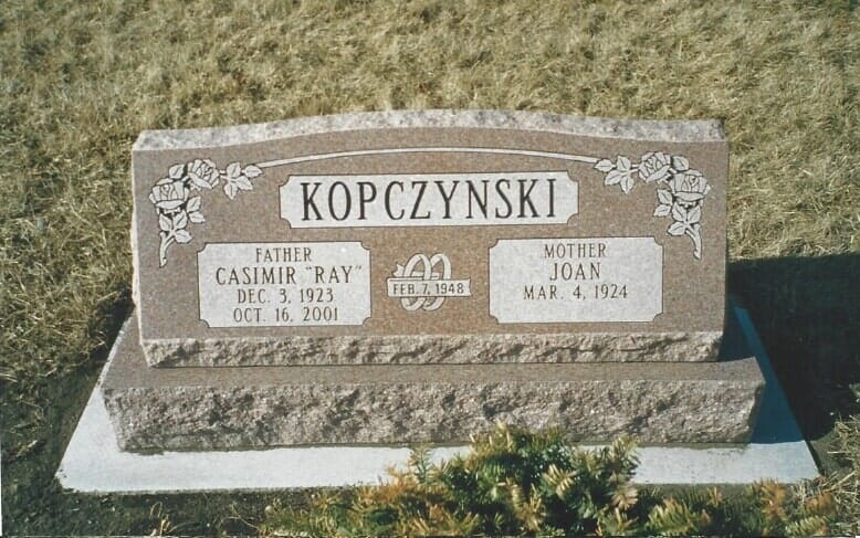Headstone of a couple named Kopczynski. Father 