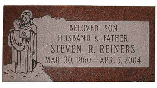 Headstone of Steven R. Reiners, with an engraving of Jesus and a child.