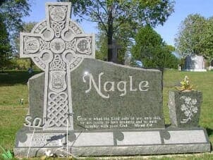 Gray Celtic cross and tombstone, green stone, 