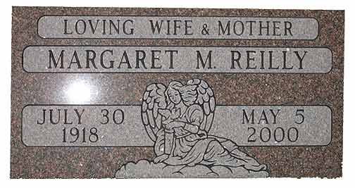 Gravestone of Margaret M. Reilly, a loving wife & mother. Dates: July 30, 1918 - May 5, 2000. Includes an angel carving.