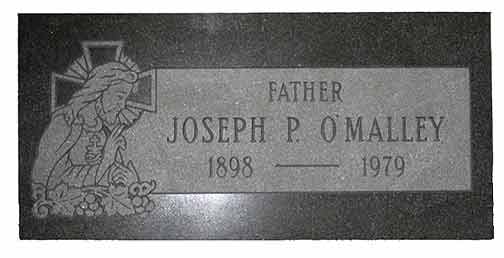 Gravestone of Father Joseph P. O'Malley. Features his name, dates 1898-1979, and a religious carving of Jesus.