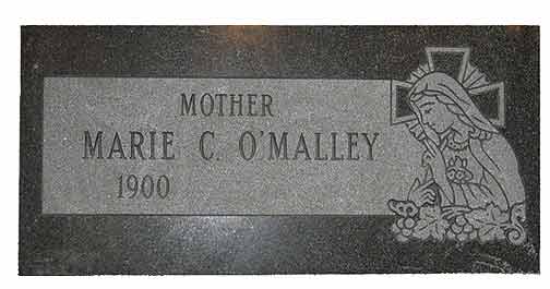 Gravestone of Mother Marie C. O'Malley (1900) with an engraved depiction of the Virgin Mary.