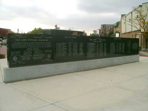Black granite memorial wall with names, Oak Lawn Veterans Memorial.