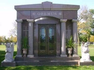 A large, ornate mausoleum with the name 