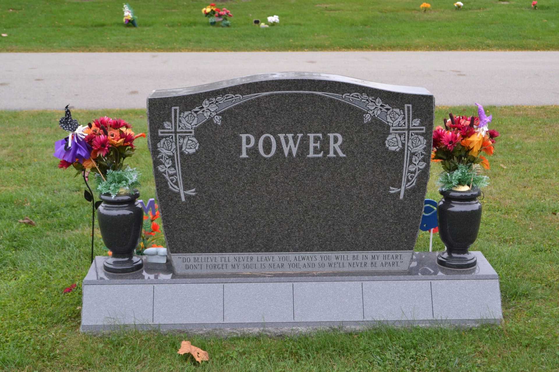 Headstone in a cemetery with the name 