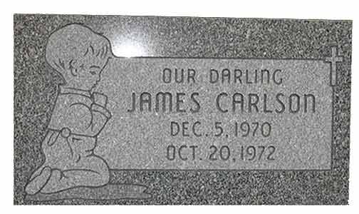 Grave marker for James Carlson: a kneeling child, text reads 