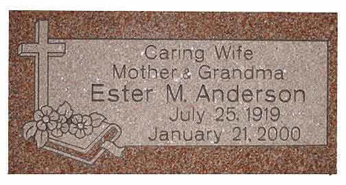 Headstone of Ester M. Anderson with cross, flowers, and dates July 25, 1919 - January 21, 2000.