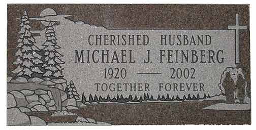 Grave marker, dark stone, reads: 