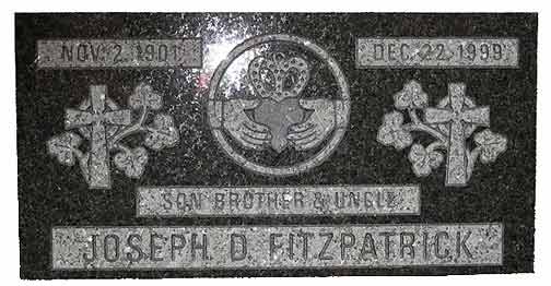 Gravestone with Celtic cross, Claddagh, dates Nov 2, 1901 to Dec 22, 1999. 