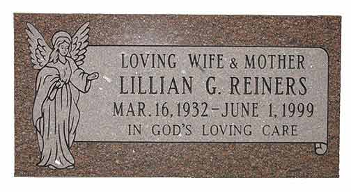 Tombstone of Lillian G. Reiners with angel carving, birth/death dates, and 