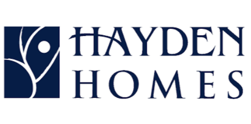 The hayden homes logo is blue and white with a tree in the middle.