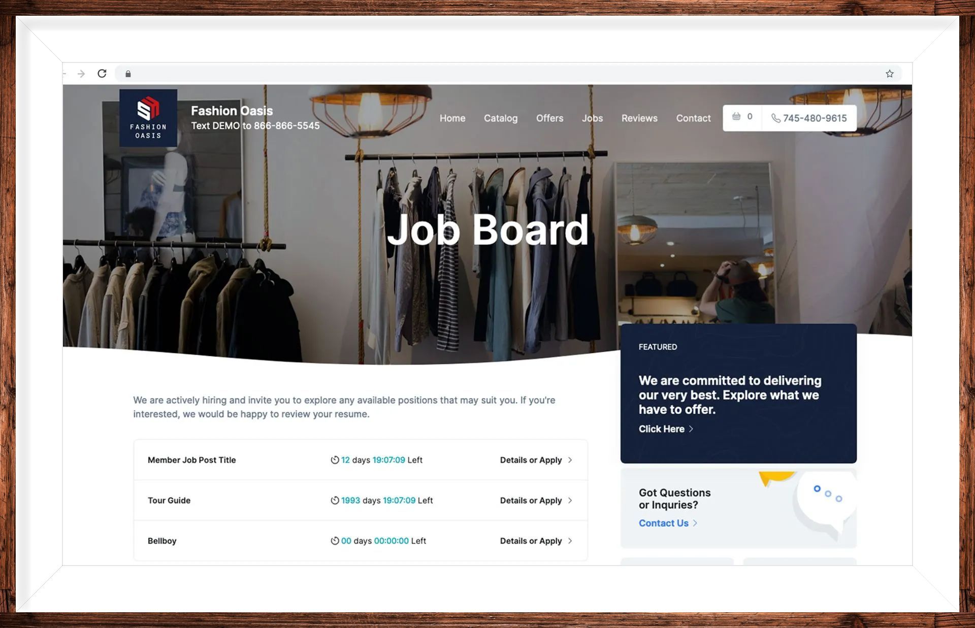 A computer screen shows a job board website with clothes hanging on racks.