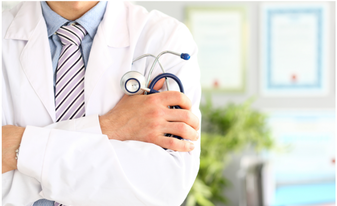 A doctor in a white coat and tie is holding a stethoscope.