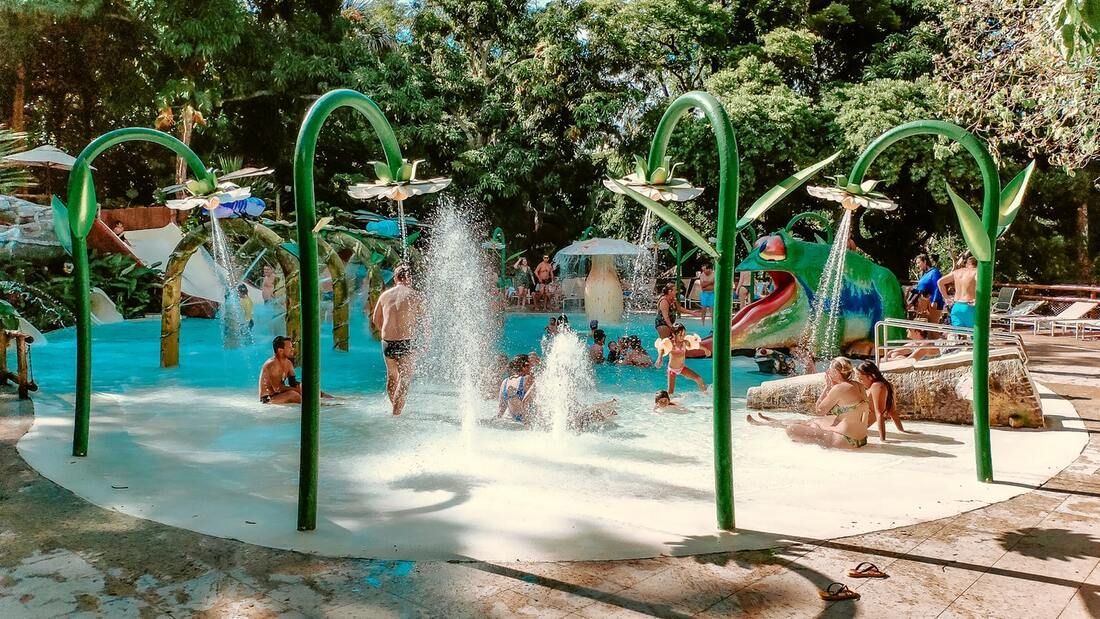 A group of people are playing in a water park.