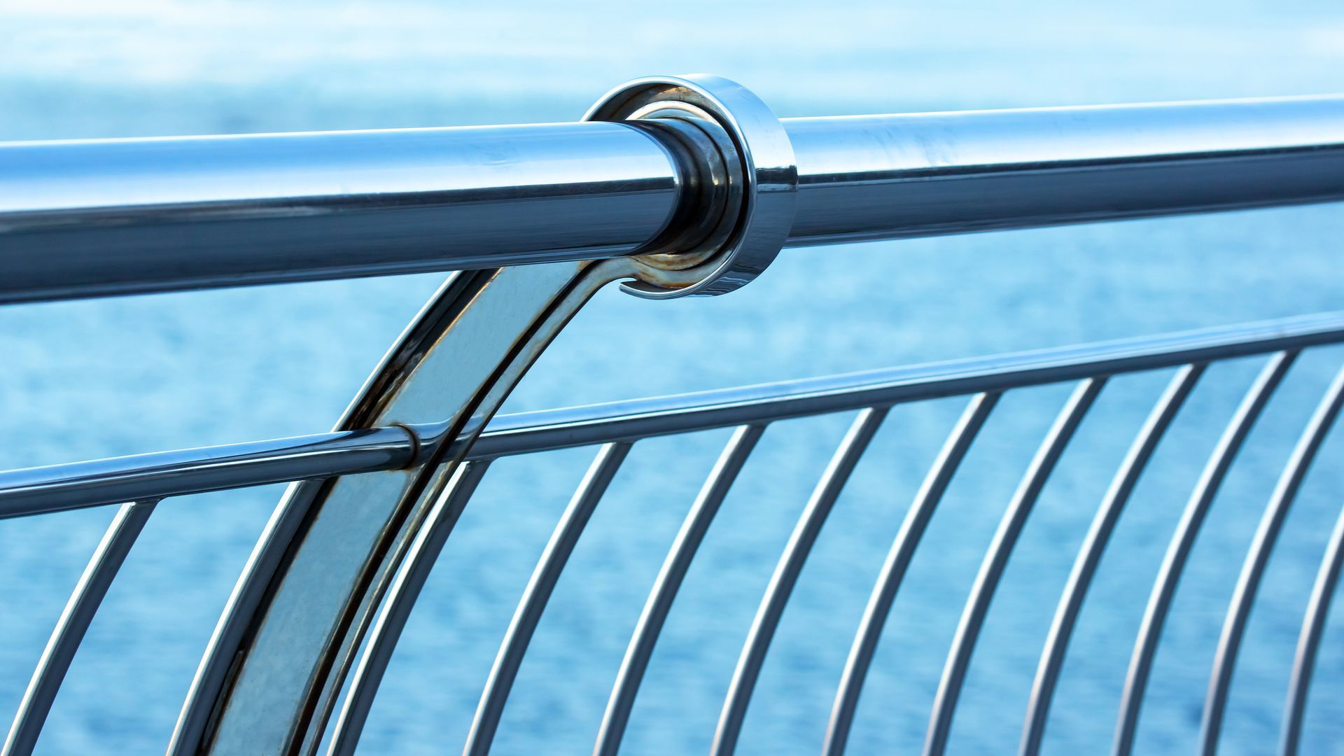 Handrail made of stainless steel near the river embankment, showcasing excellent balustrading work.