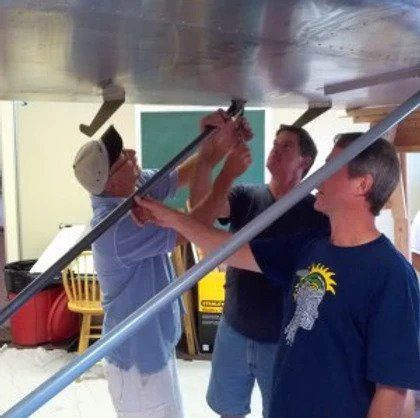 A man wearing a blue shirt with the statue of liberty on it
