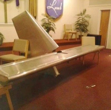 The word lamb that is on a wall