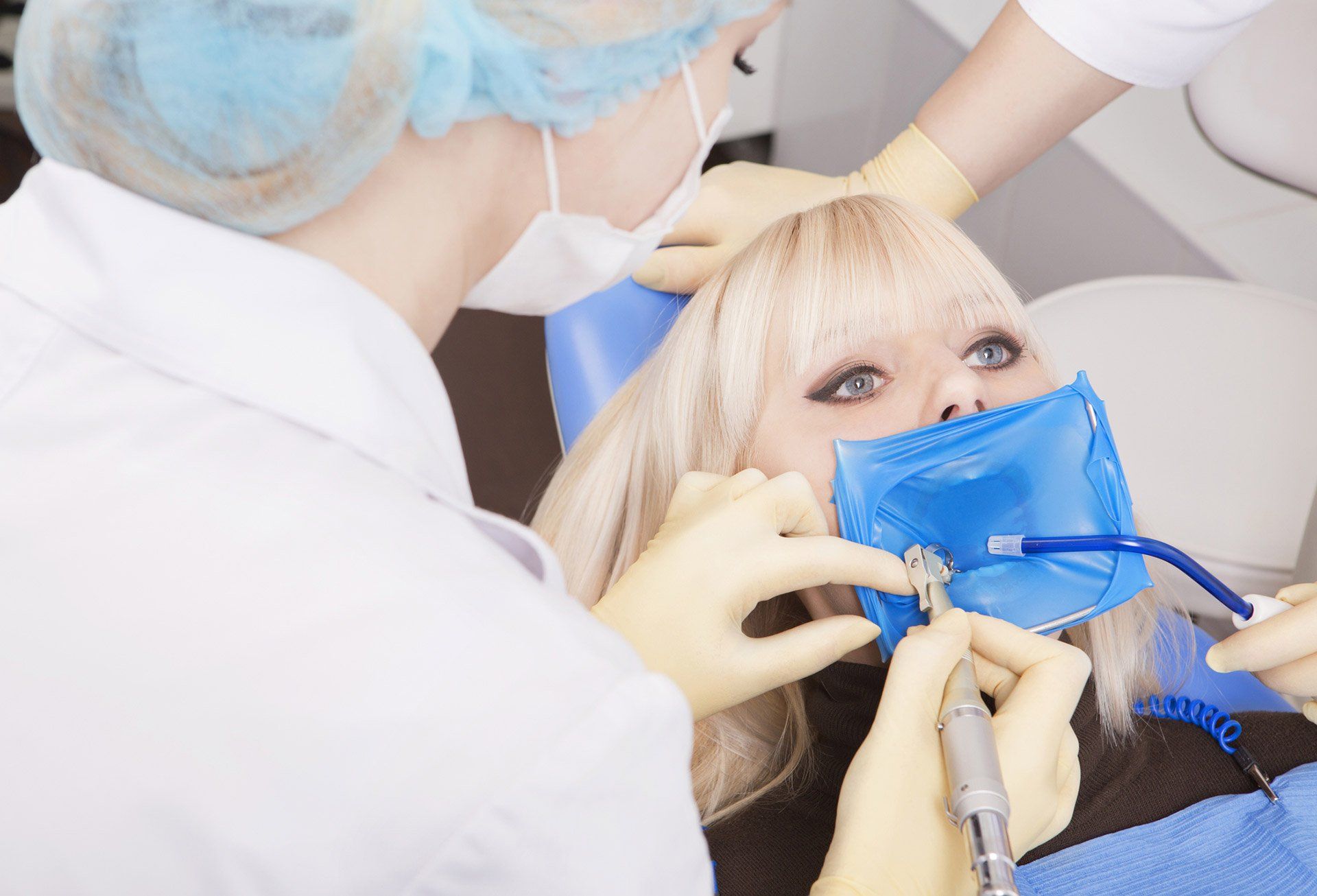 woman getting a tooth extraction