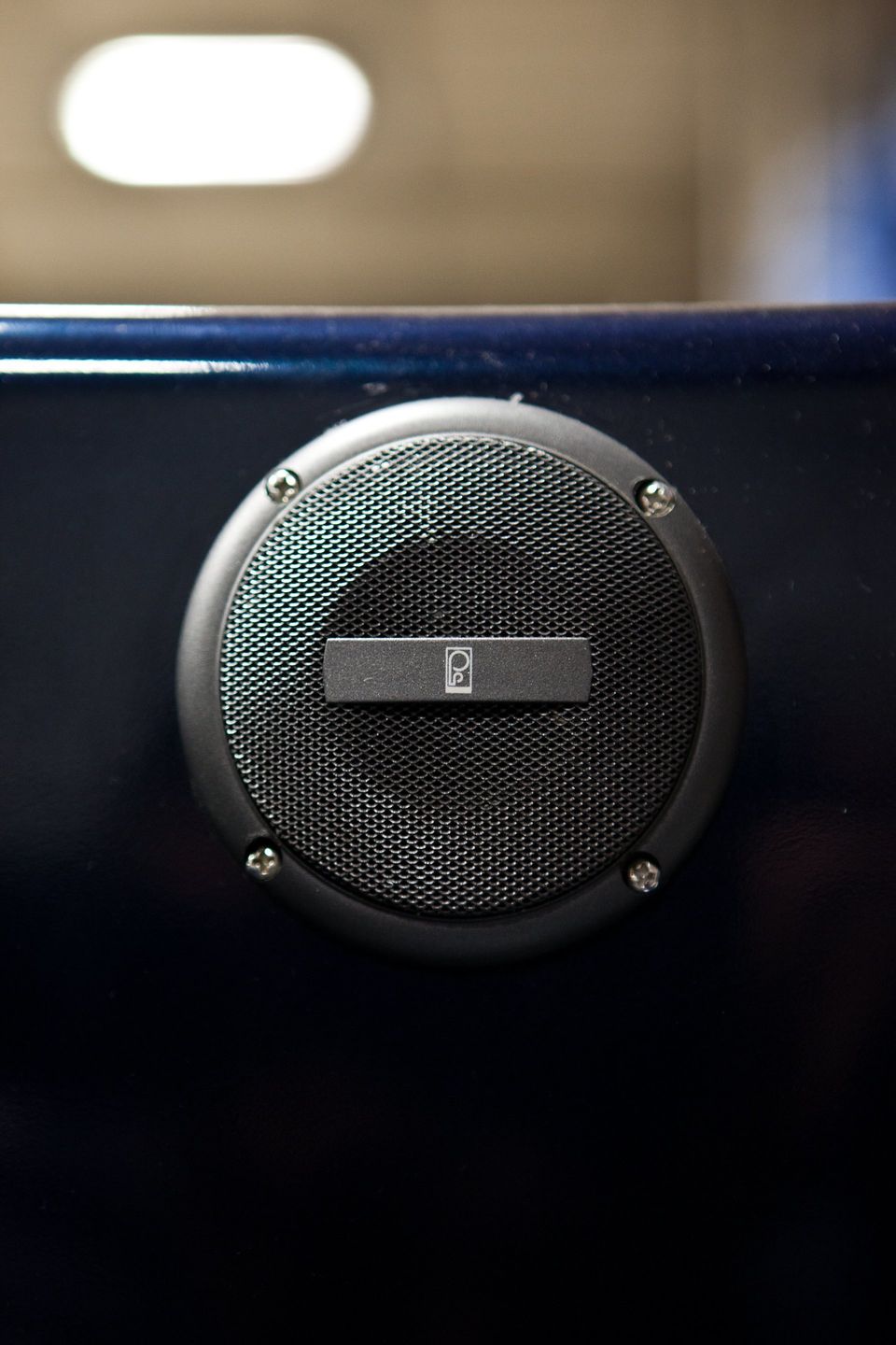 A close up of a speaker with the letter e on it.