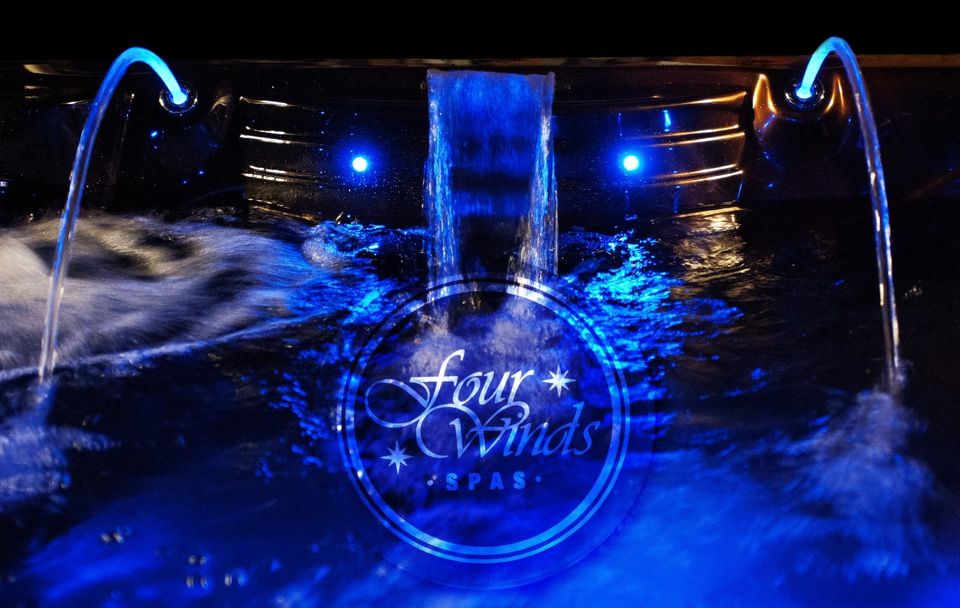 A fountain with the words four wheels on it