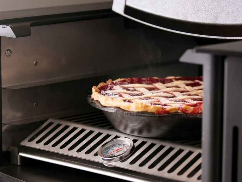 Kuma Applewood wood cookstove with oven and cooktop for home heating in Tumwater, WA installed by Capital City Stove