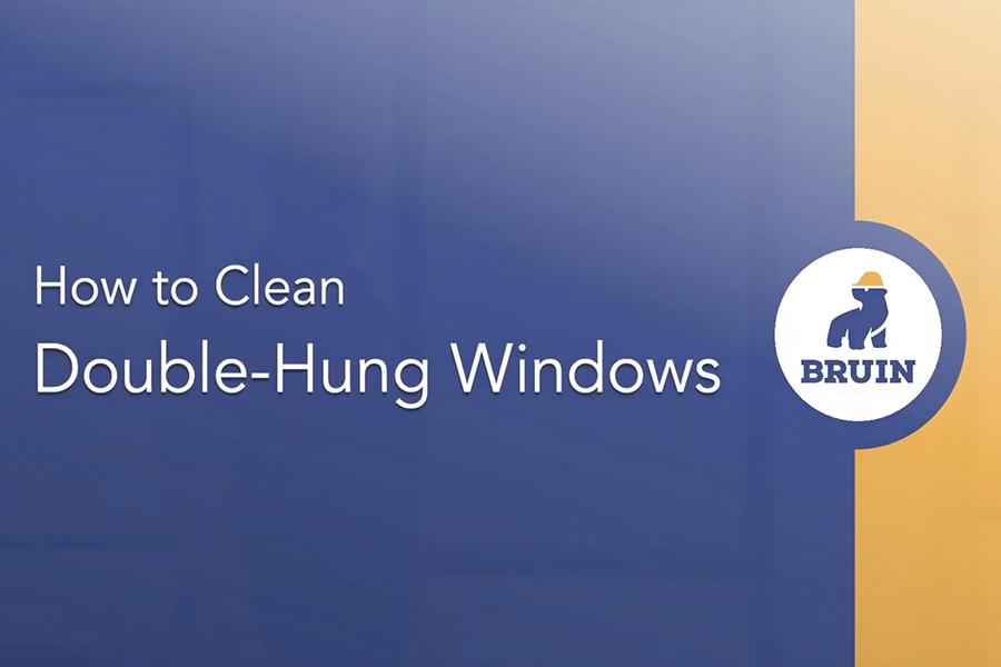 A blue and yellow sign that says `` how to clean double-hung windows ''