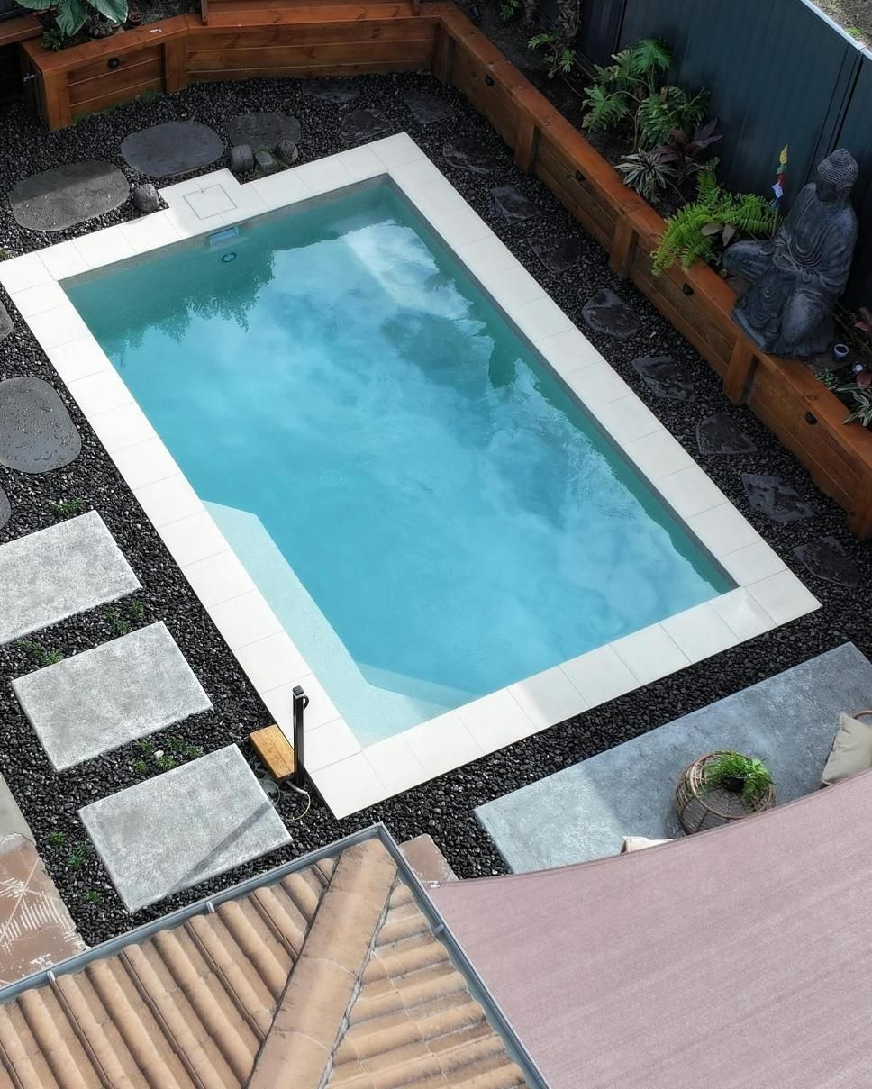 An Aerial View of a Swimming Pool in a Backyard — Pools By Design in Warana, QLD