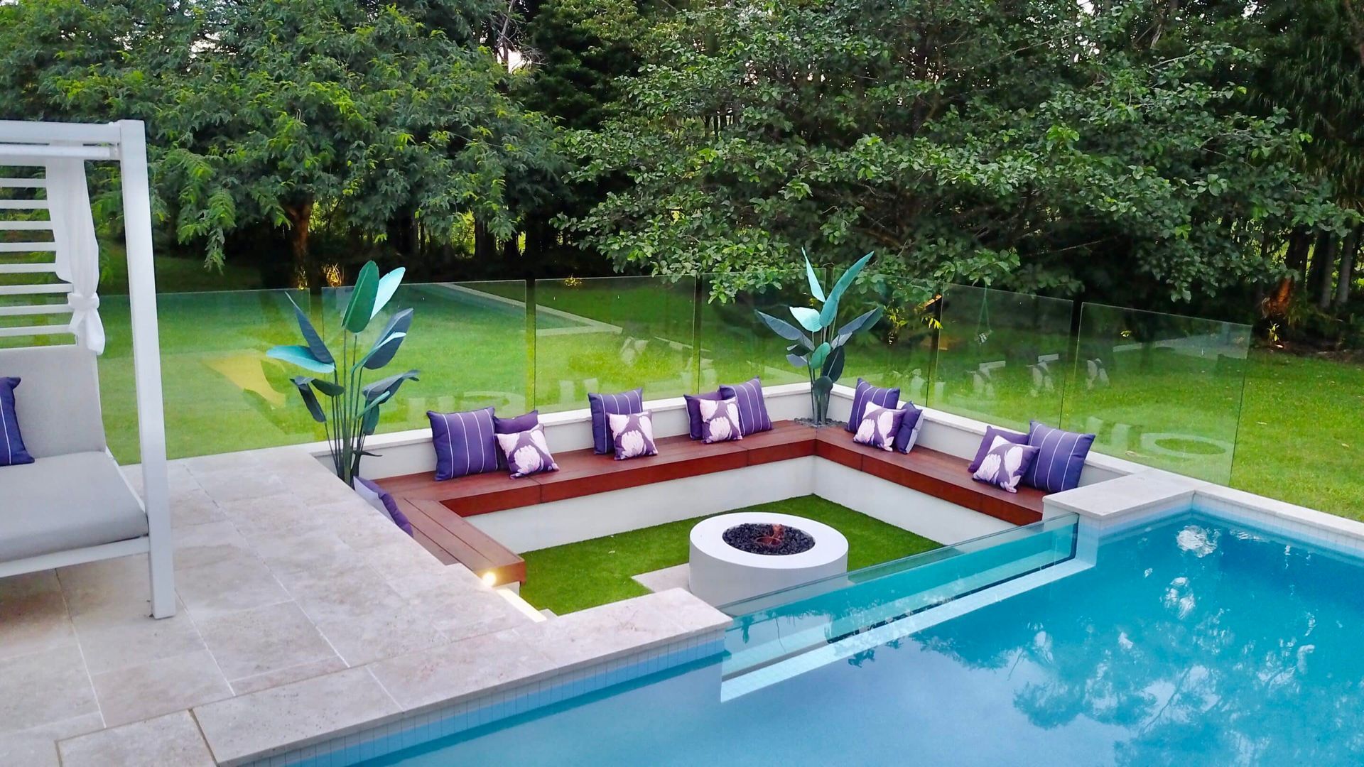 There is a Fire Pit in the Middle of the Pool — Pools By Design in Warana, QLD