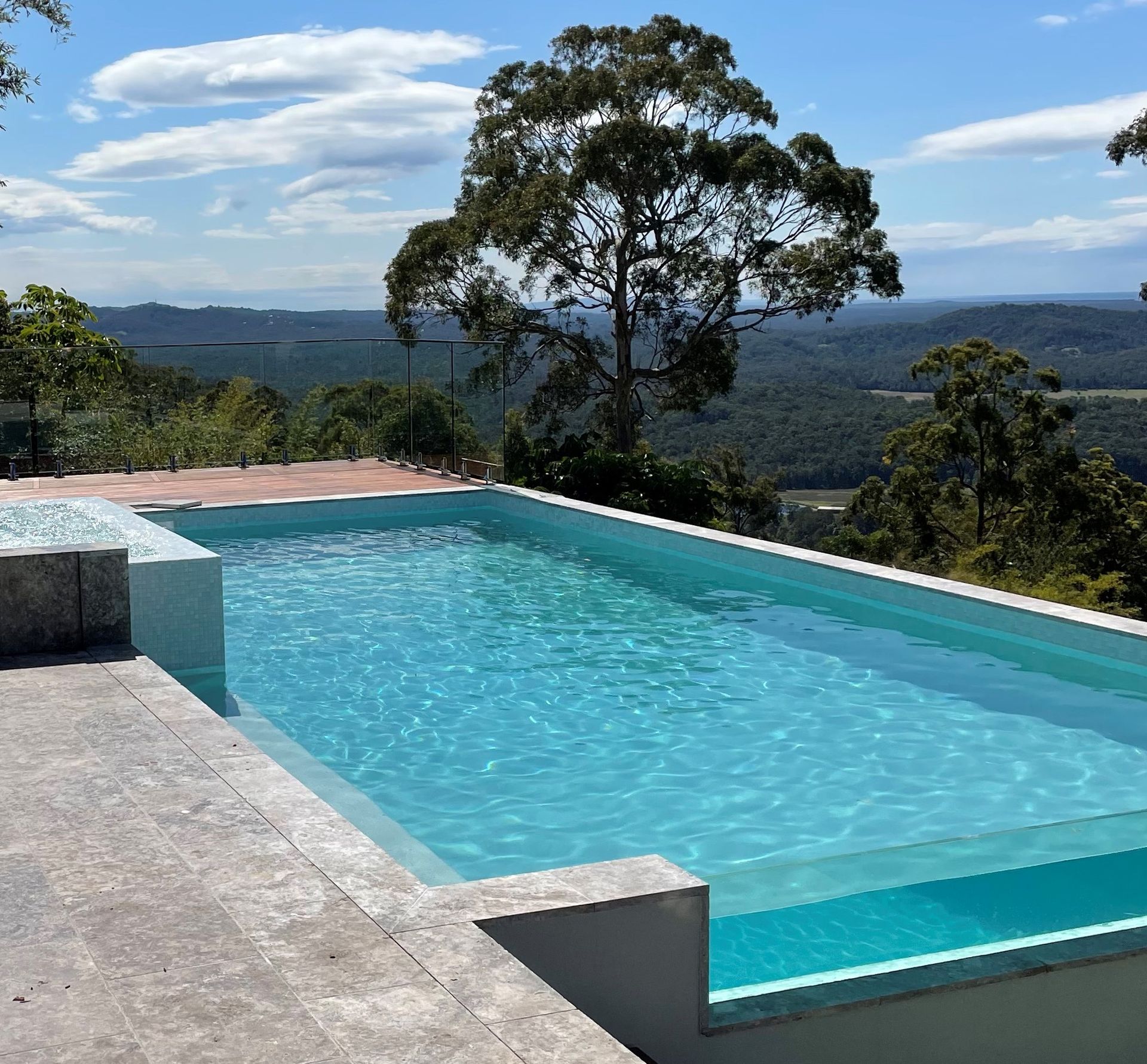 A Swimming Pool With a T on the Bottom of It — Pools By Design in Maroochydore, QLD