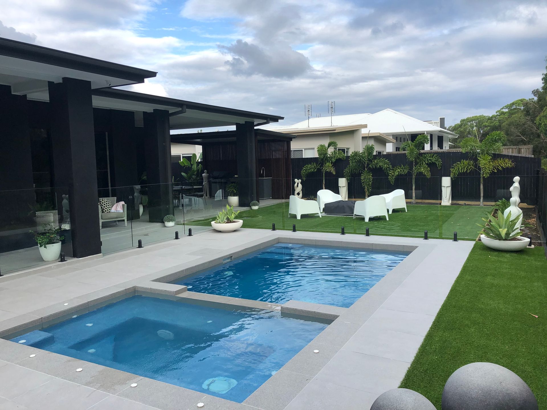 A Large Rectangular Swimming Pool With Stairs Leading to It — Pools By Design in Warana, QLD