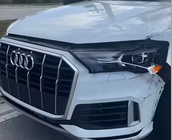 A white audi q7 is parked on the side of the road | AP Autohouse