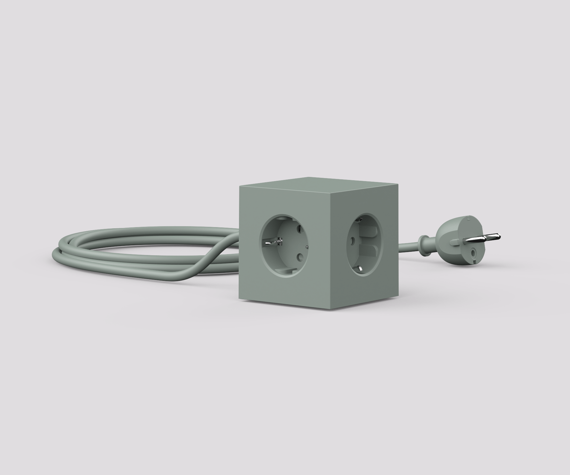 Ein Würfel mit zwei Steckdosen und einer daran befestigten Schnur.